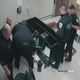 Illustration for article titled Louisiana Police Chief Under Fire After Leaked Surveillance Footage Shows Him Punching Handcuffed Black Man